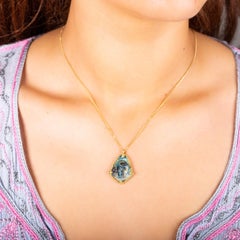 Amáli Carved Andamooka Opal Skull Necklace