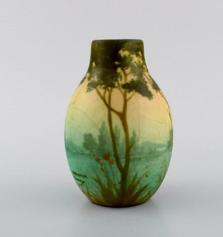 Amalric Walter (1870-1959) for Nancy. Rare vase in glazed ceramics decorated with river landscape. 
Beautiful crackled glaze. Museum quality, 1890s.
Measures: 14 x 9 cm.
In excellent condition.
Stamped.