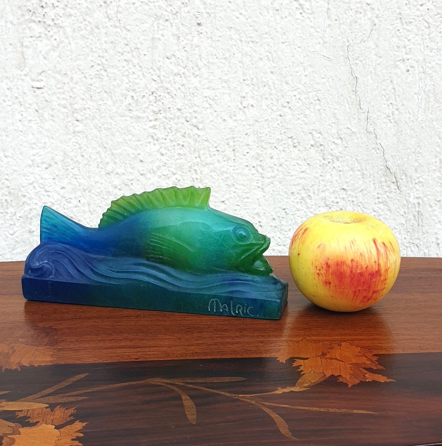 Fish in glass paste in a gradient of green and blue, signed A Walter Nancy

Good general condition, small chip at the mouth of the fish and below the tail

Art Nouveau

Amalric Walter, born in 1870, trained at the Manufacture of Sèvres, then set up