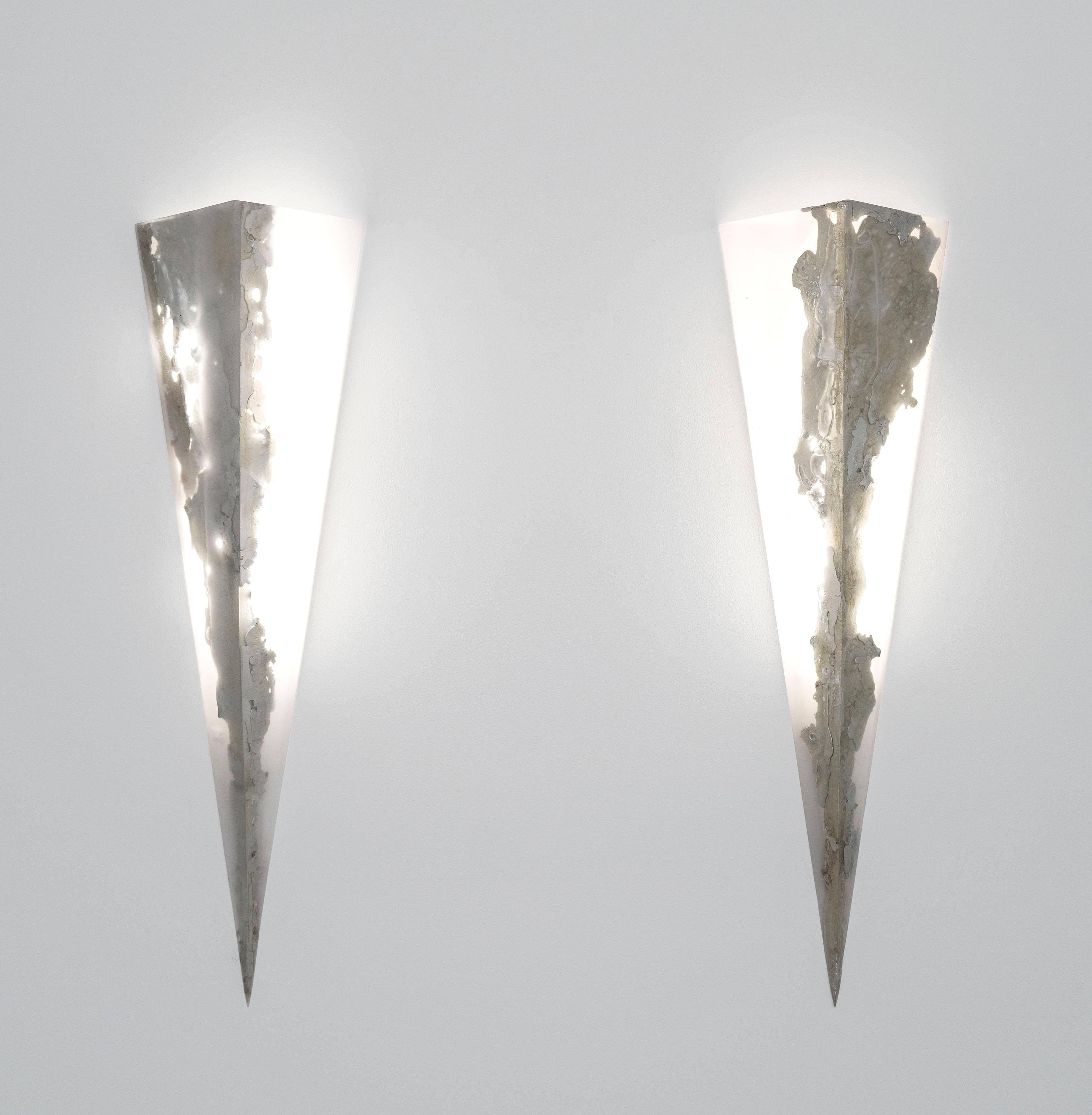 This Prism Sconce is a wall lamp, sculpted from resin and pewter by Brooklyn-based designer, Amanda Richards. Her practice focuses on lighting as sculpture.

The designer utilizes recycled materials in her technique. Vintage metal objects are