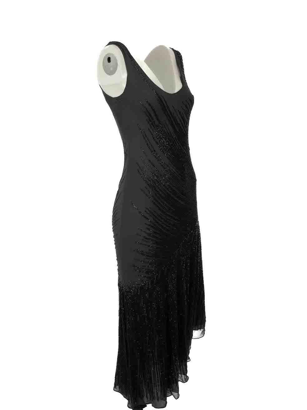 CONDITION is Very good. Minimal wear to dress is evident. Minimal wear to front right seam where some missing sequins on this used Amanda Wakeley designer resale item.

Details
Black
Silk
Dress
Beaded embellishment
Sleeveless
Round neck
Maxi

Made