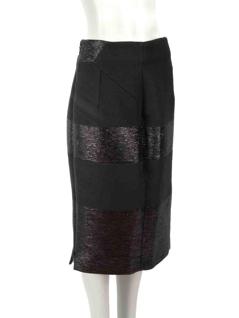 CONDITION is Good. Minor wear to skirt is evident. Light pulls to overall fabric on this used Amanda Wakeley designer resale item.

Details
Black
Cotton
Pencil skirt
Knee length
Metallic textured panels
Back open ended zip fastening

Made in