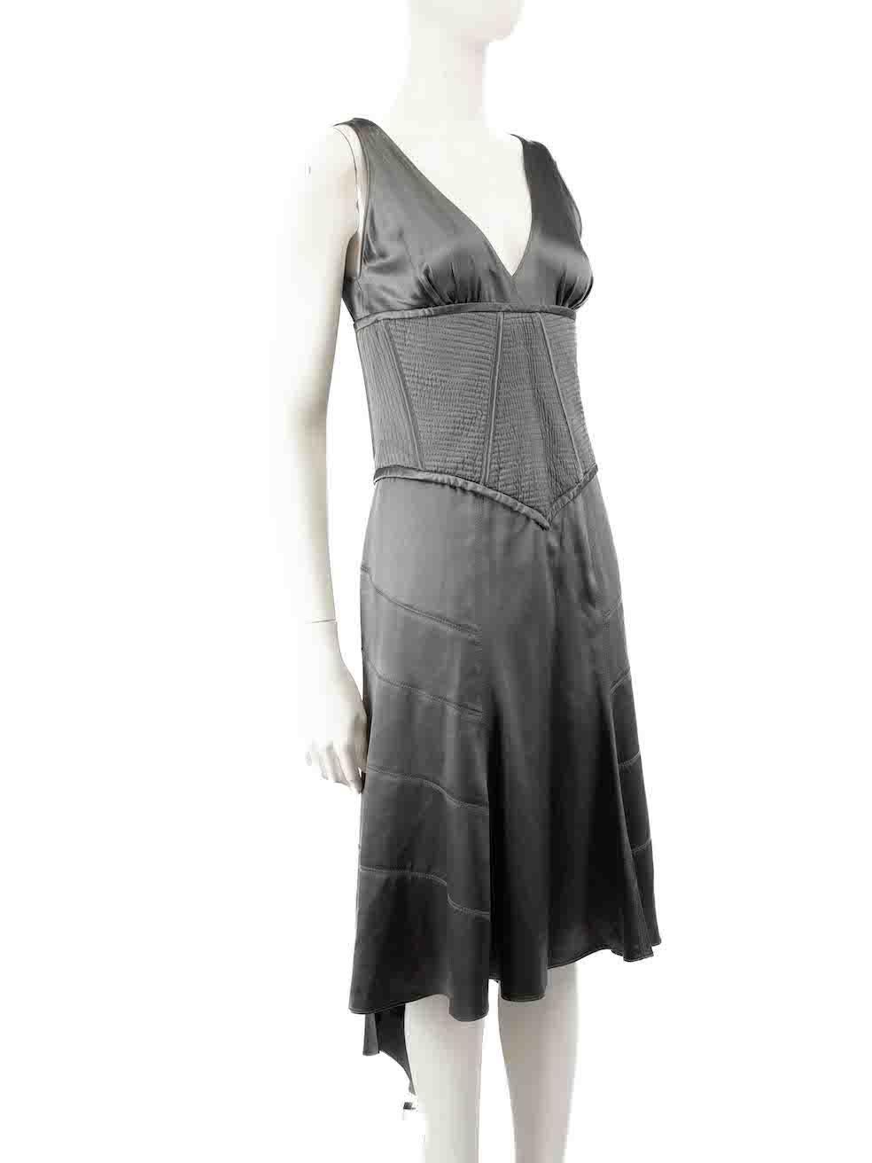CONDITION is Good. General wear to dress is evident. Moderate signs of wear to the stitching inside the neckline with a small tear seen near the bottom of the side zip on this used Amanda Wakeley designer resale item.
 
 
 
 Details
 
 
 Grey
 
