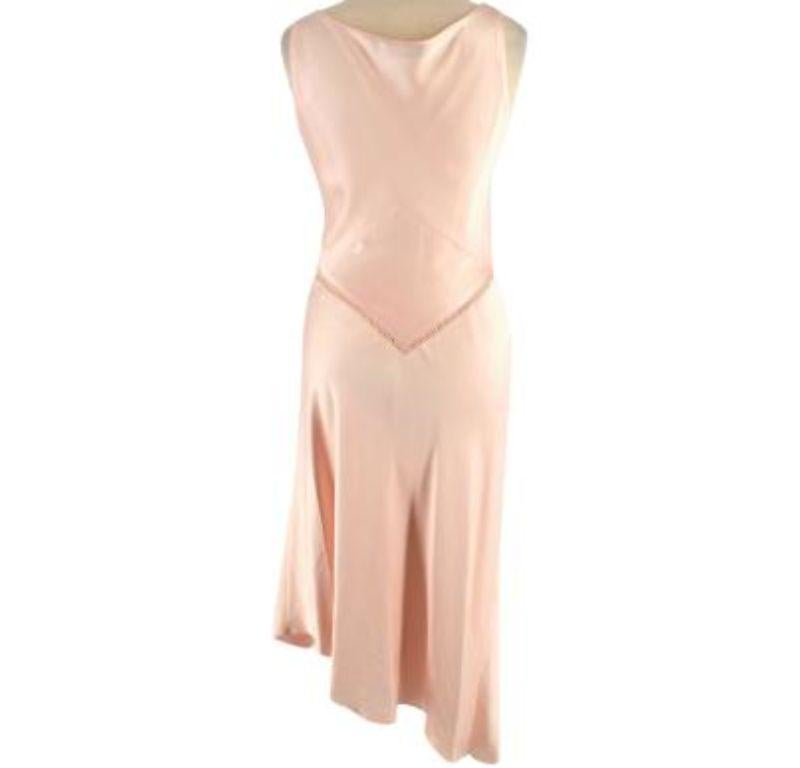 Amanda Wakeley Pale Pink Silk Slip Dress

- Pale pink satin silk a-symmetric slip dress
- V-neck with embroidery detail 
- A-symmetric hem
- Unlined soft satin silk

No care label but fabric is estimated as silk so dry clean only is recommended 

No