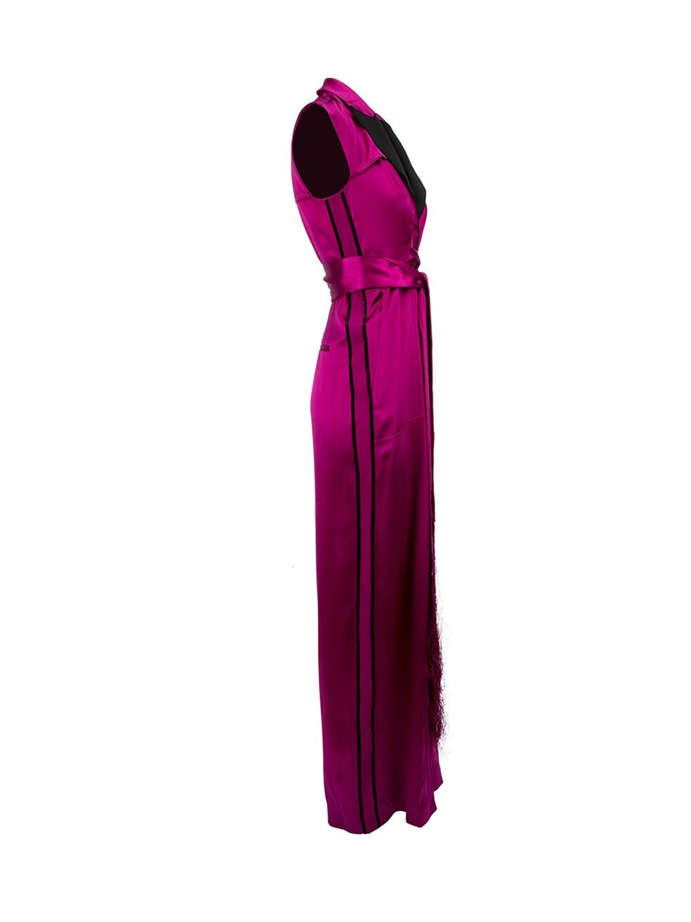 CONDITION is Very good. Minimal wear to jumpsuit is evident. The hemline is unstitched and there is a small stain near the bottom of the right pant leg on this used Amanda Wakeley designer resale item.



Details


Purple

Silk

Jumpsuit

Accent
