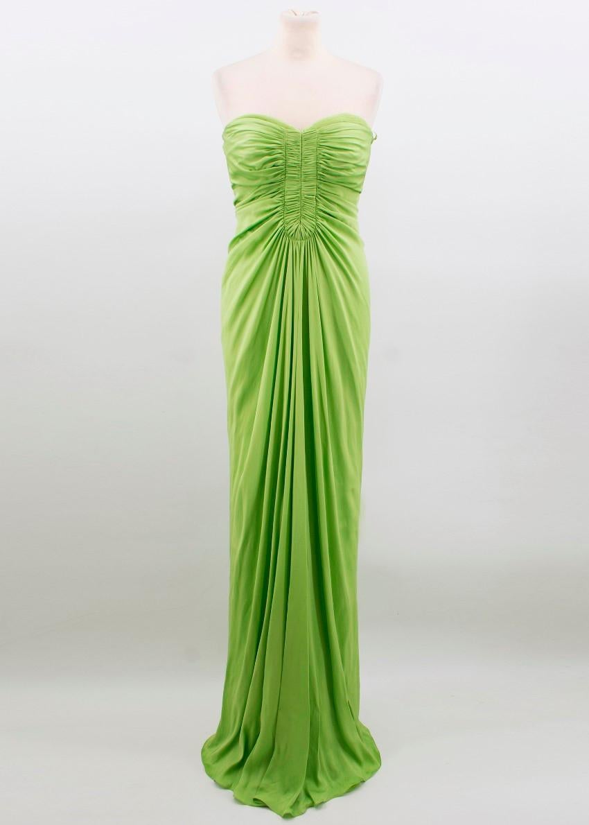 Amanda Wakeley green strapless gown with ruched detail. 
- Hook and zip closure
Minor marks on the bottom of the gown (see images for further detail) 

Please note, these items are pre-owned and may show signs of being stored even when unworn and
