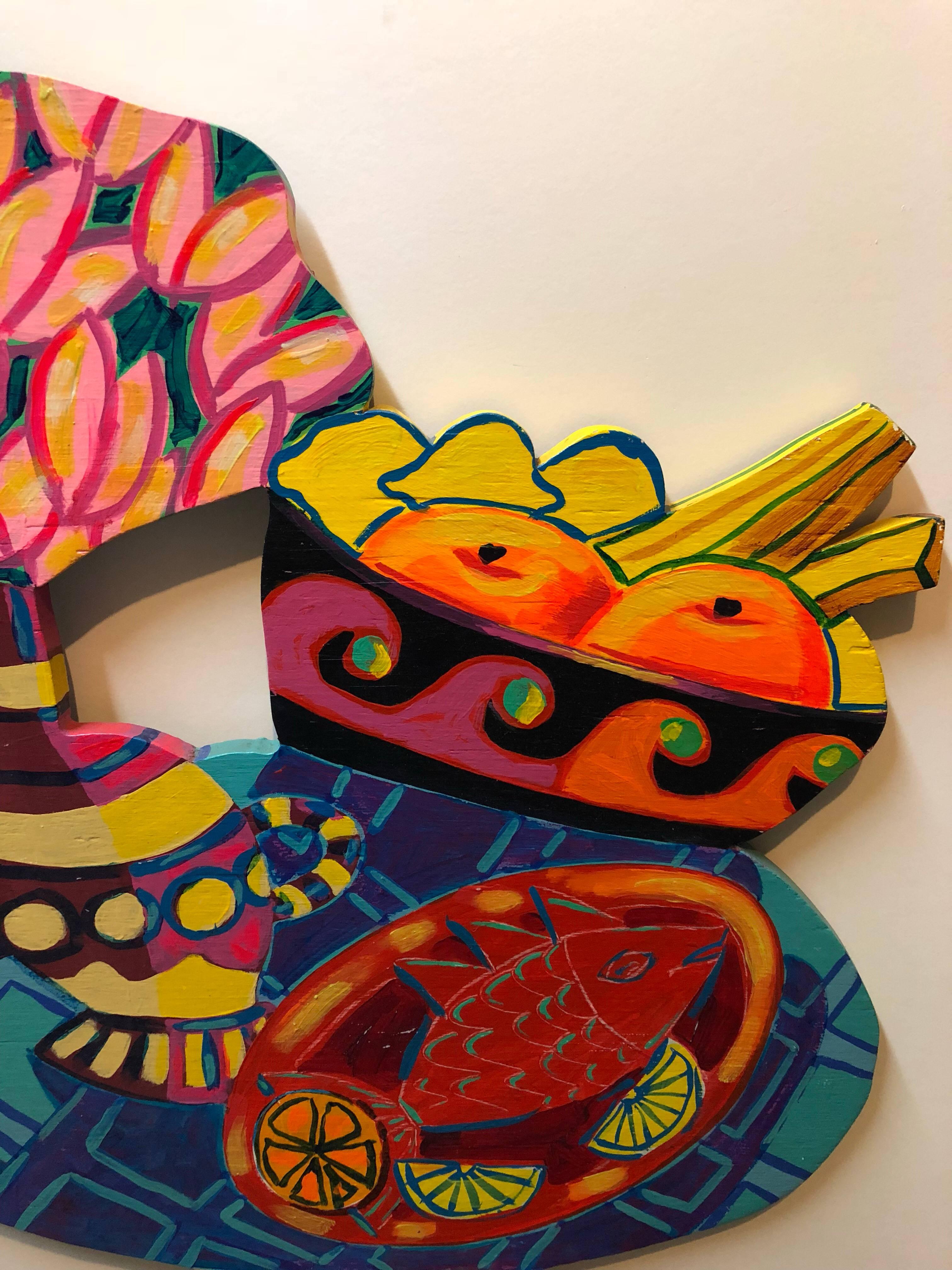 This is a colorful wall hanging sculpture by Irish Californian Pop Artist Amanda Watt
A self-confessed ‘Fusionist’, Amanda pays homage to the past: the multiple perspectives of cubism; the bright energy of expressionism and the simplicity of
