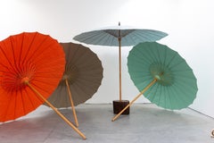Amapola Outdoor Umbrellas in Wood and Sunbrella by CEU Studio