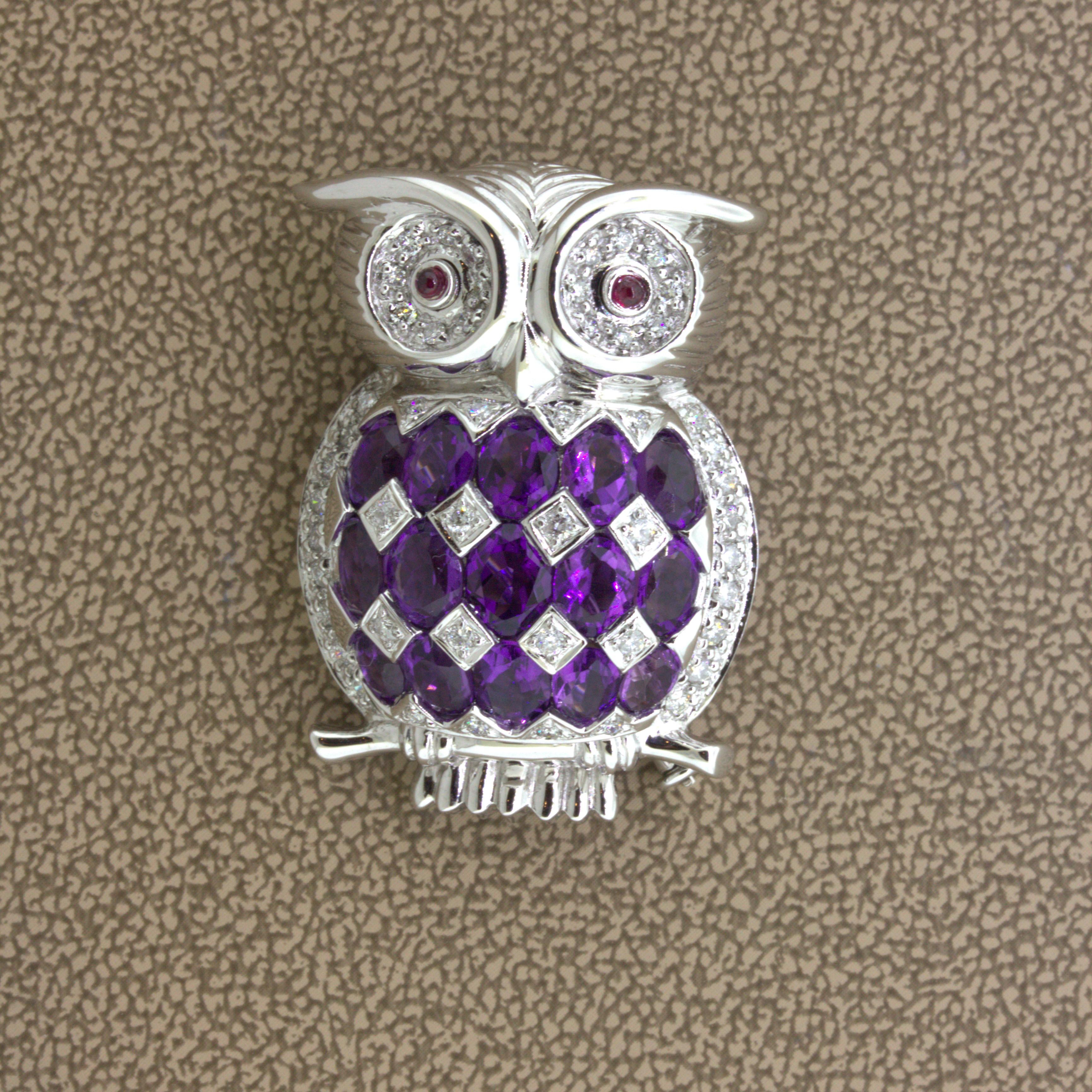 A fun and stylish owl that can be worn as a brooch or pendant! It features 15 oval-shaped amethyst, weighing approximately 4 carats total, which has rich royal-purple color. Adding to that, are 0.52 carats of round brilliant-cut diamonds set around