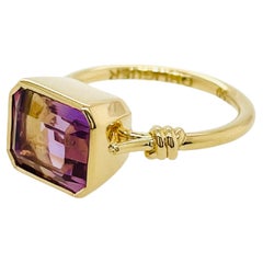 Anillo Amatrine Baby estilo nudo en oro amarillo de 18 ct