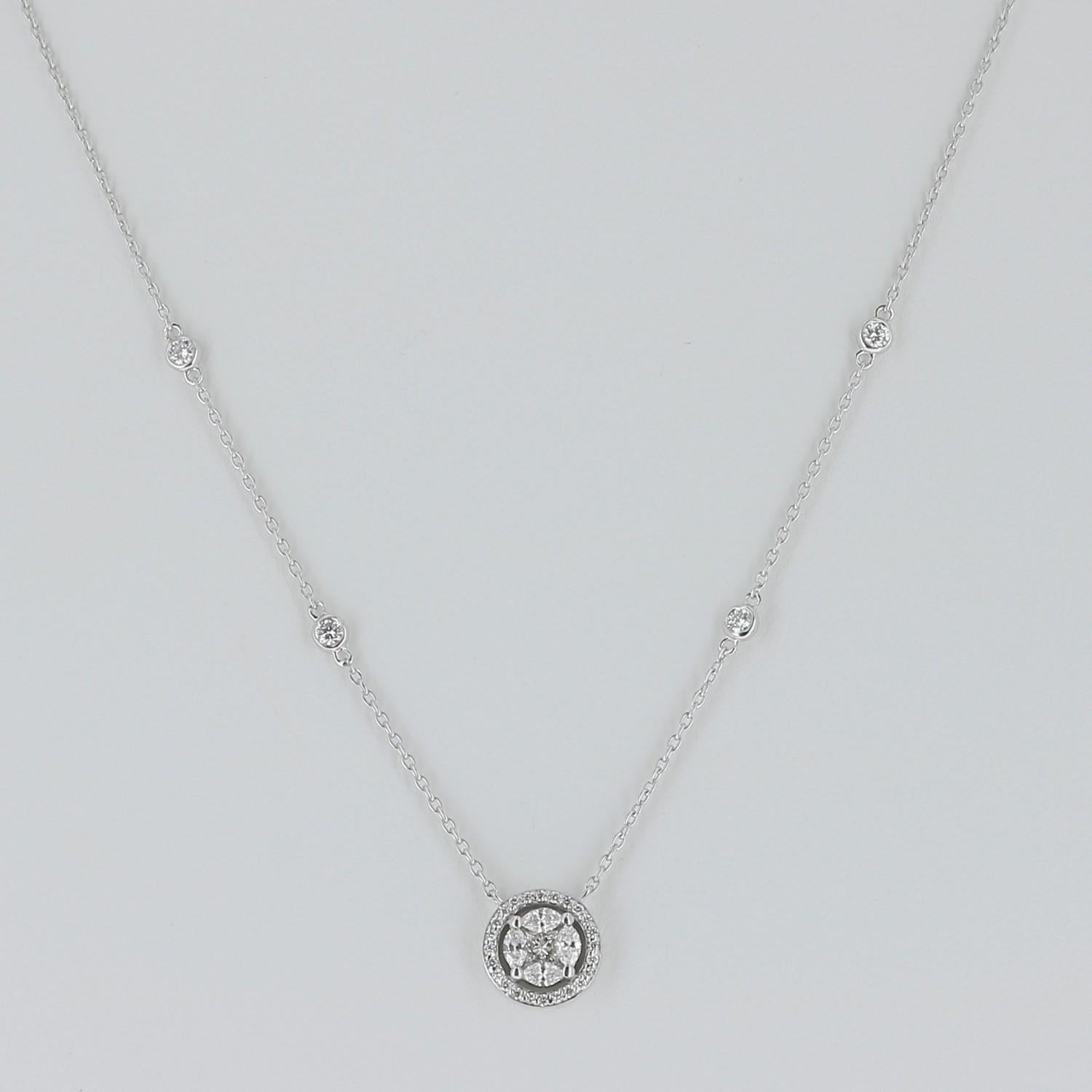 An amazing marquise pendant necklace set with 4 Marquise Diamond and Round Diamonds weighing 0.57 Carats.
The necklace is set with 4 Brilliant Diamond and measure 43 Cm.
The diamonds are GVS grade. 
The Chain is in 18K gold.
The Clasp is double