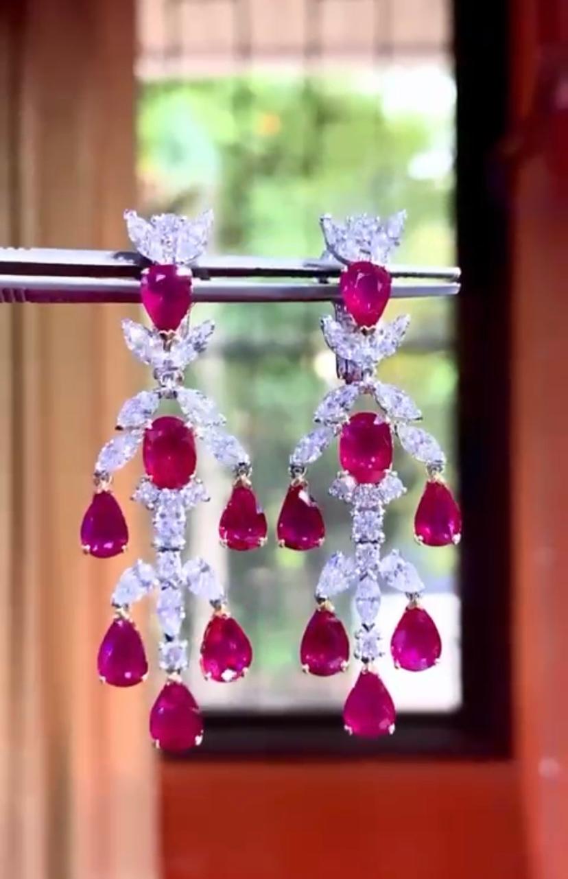 An exquisite design, so chic and refined, a very hard piece, so sparkly and glamour.
Earrings come in 18k with 14 pieces of natural Burma rubies of 10,33 carats, extra fine quality, in pear cut , gorgeous color , and 36 pieces of  natural diamonds