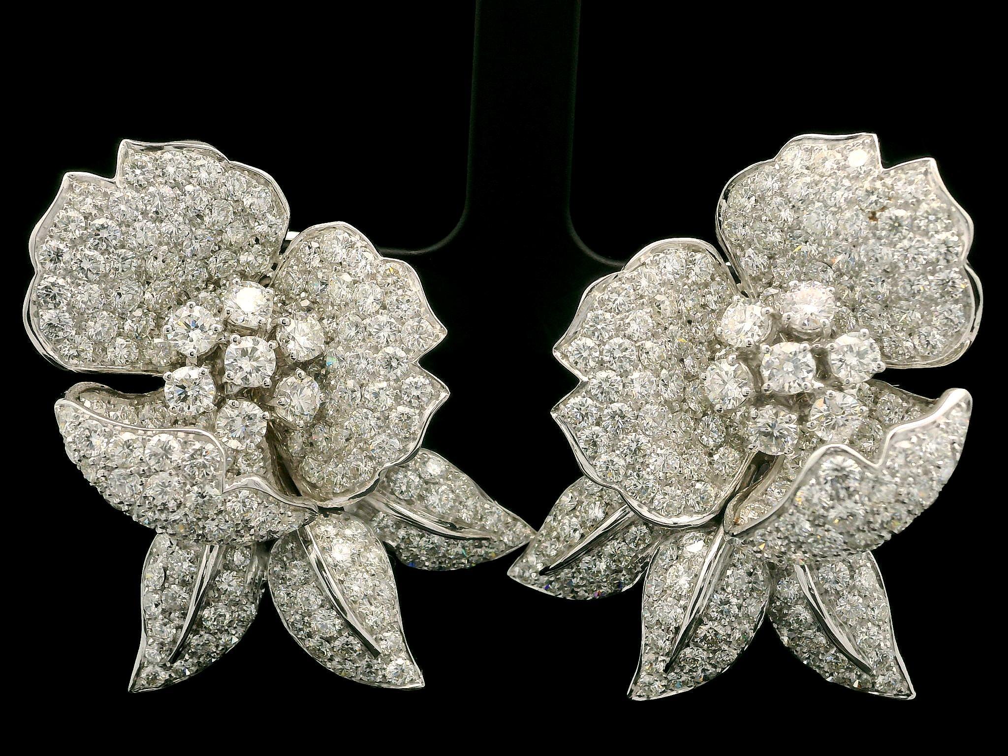 --Stone(s):--
Numerous Natural Genuine Diamonds - Round Brilliant Cut - Pave & Prong Set - F-H Color - Mostly VS1/VS2 w/ Few SI1-SI2 Clarity - 16ctw (approx.)

Material: Solid 18k White Gold
Weight: 36.90 Grams
Backing: Posts w/ Omega Closures