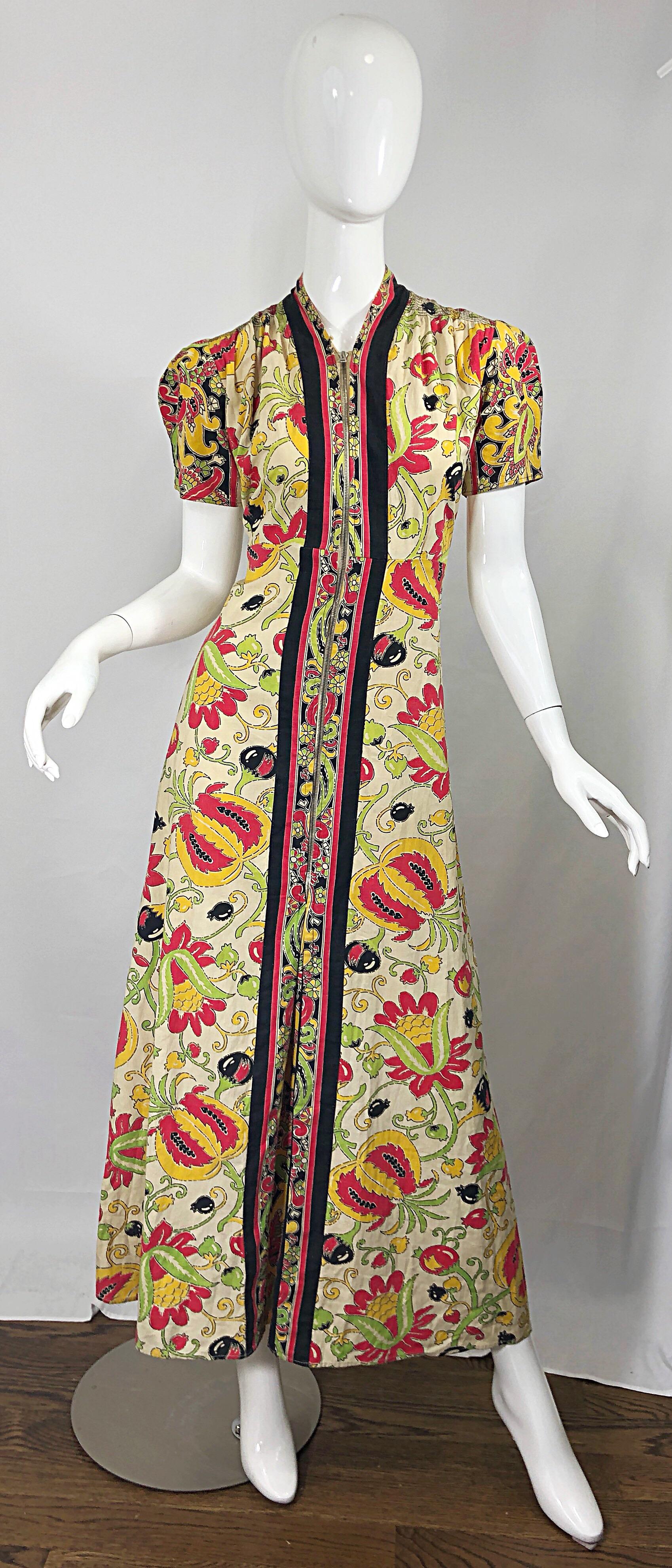 Amazing vintage 1940s Botanical Asian inspired linen and cotton maxi dress! Features vibrant colors of red, green, yellow, black and beige. Full metal zipper up the front to control cleavage. Chic slightly puckered puff sleeves. Very well made, with