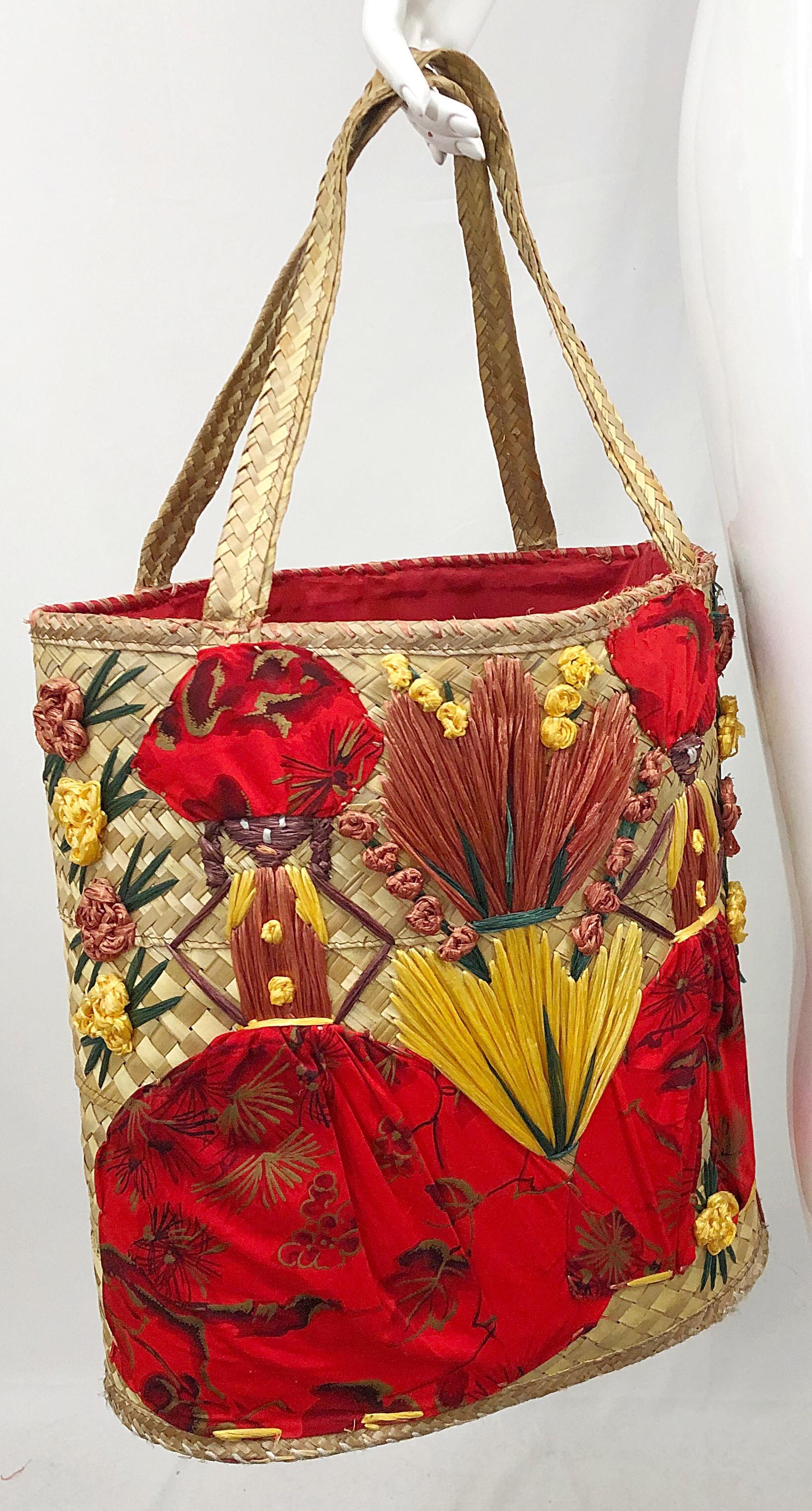 Amazing 1970s extra large novelty embroidered raffia tropical Hawaiian straw tote bag ! Features a vibrant red lining, which is a symbol of good luck with money. Can be worn on the shoulder or carried in hand. Vibrant colors of red, yellow, green,