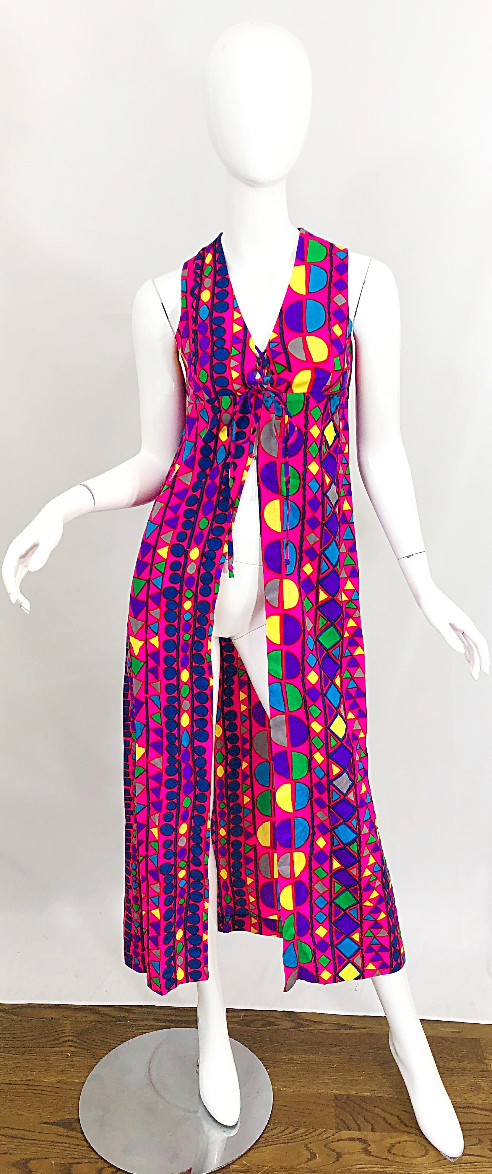 Amazing 1970s vintage JOSEPH MAGNIN vibrant colorful abstract mosaic sleeveless vest / maxi dress! Features bright hot pink fuchsia, blue, purple, green, yellow, and grey throughout. Laces up the front can adjust size. Elastic band in back also