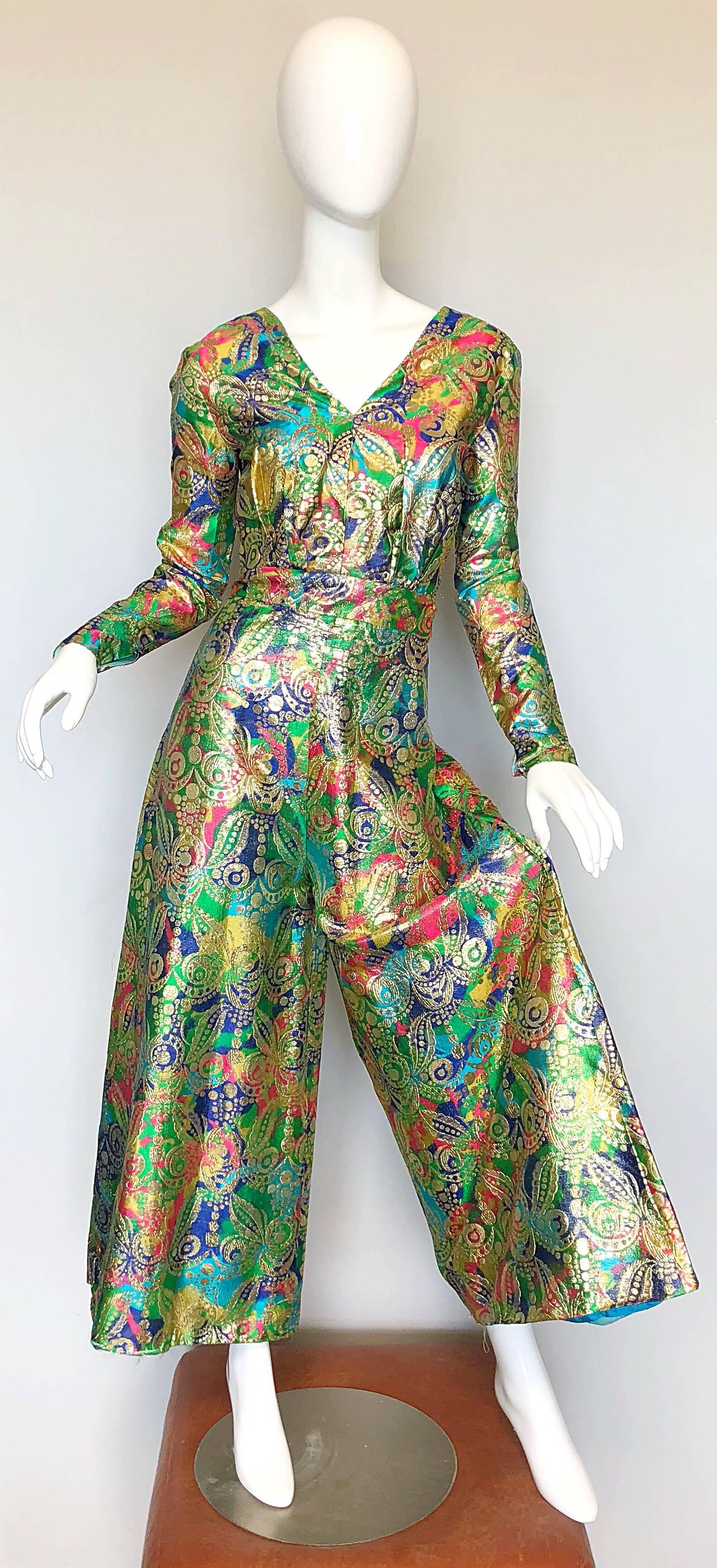 Amazing vintage 1970s long sleeve metallic paisley wide leg / palazzo jumpsuit! Features a tailored bodice with sleek long sleeves. Forgiving wide leg pants look fantastic on! Full metal zipper up the back with hook-and-eye closure. Very well made,