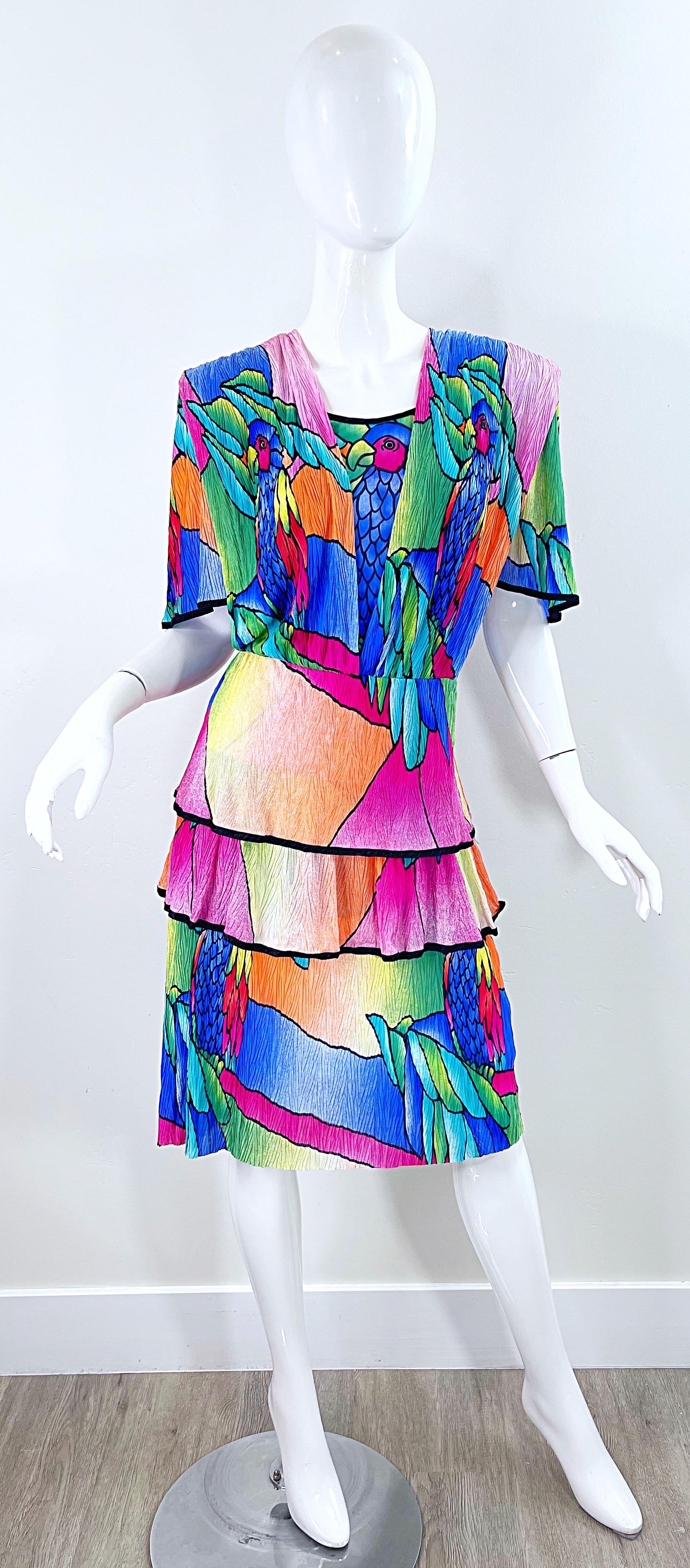 Amazing 1980s PUSZTA novelty parrot print margaritaville short sleeve colorful dress ! Shoulder pads at each shoulder. Hidden zipper up the back. The perfect statement dress for any party !
In great condition
Approximately Size Medium /