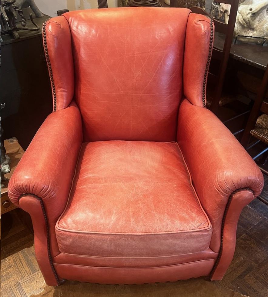Amazing and soft leather club chair with an amazing faded patina.This chair is in a top quality leather.The condition is very good and super comfortable.