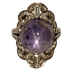 Amazing 25.50 Carat Blue Violet Star Sapphire and Diamond Platinum Art Deco Ring