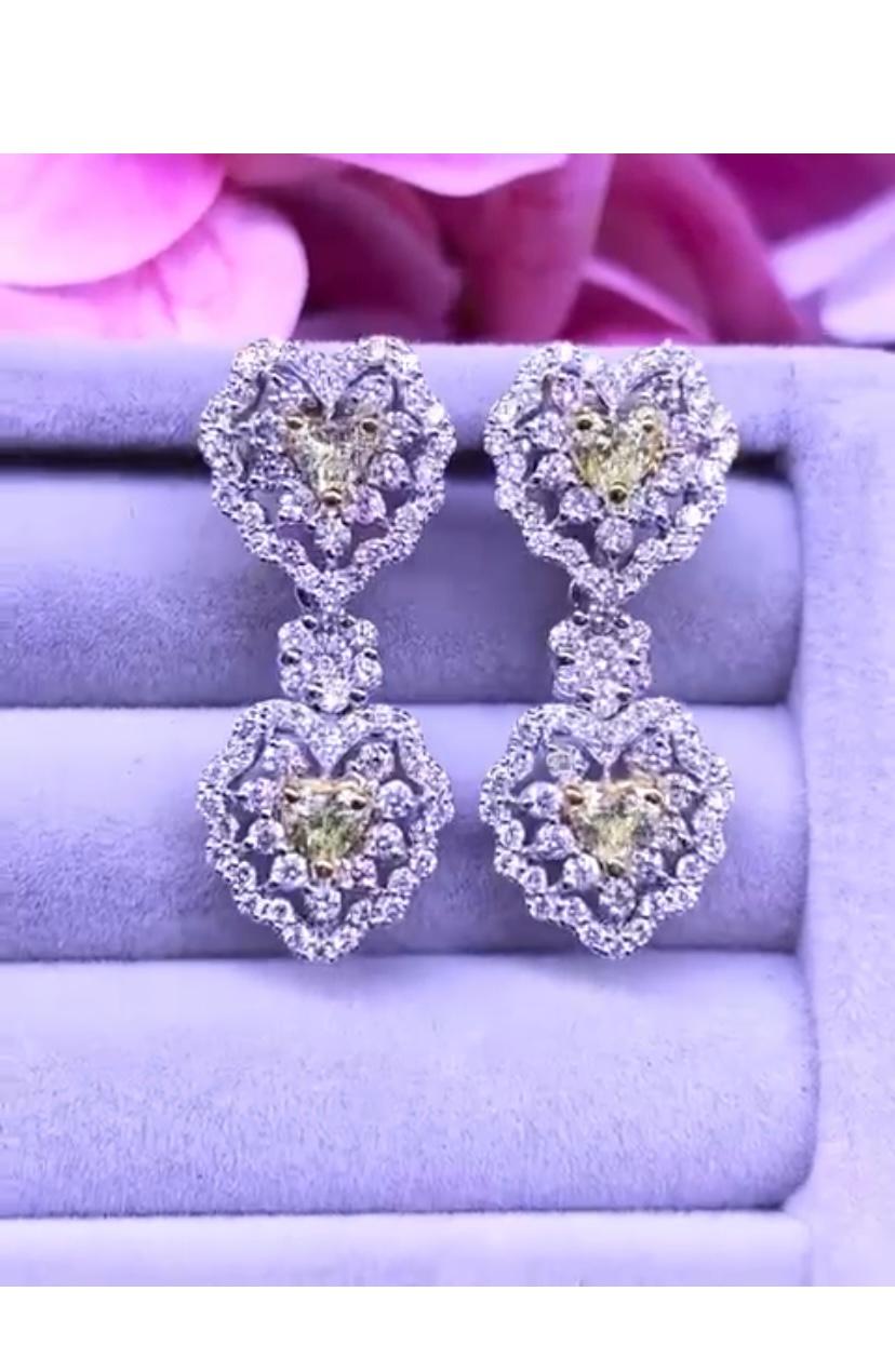 From love collection, an  exquisite heart design , so chic and elegant, a very glamour style.
Earrings come in 18k gold with four heart cut fancy yellow diamonds of 1,18 carats, and white diamonds of 2,34 carats,F/VS.
Handcrafted by artisan