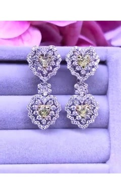 Certified 3.52 Carats Fancy Yellow Diamonds and White Diamonds 18K Gold Earrings