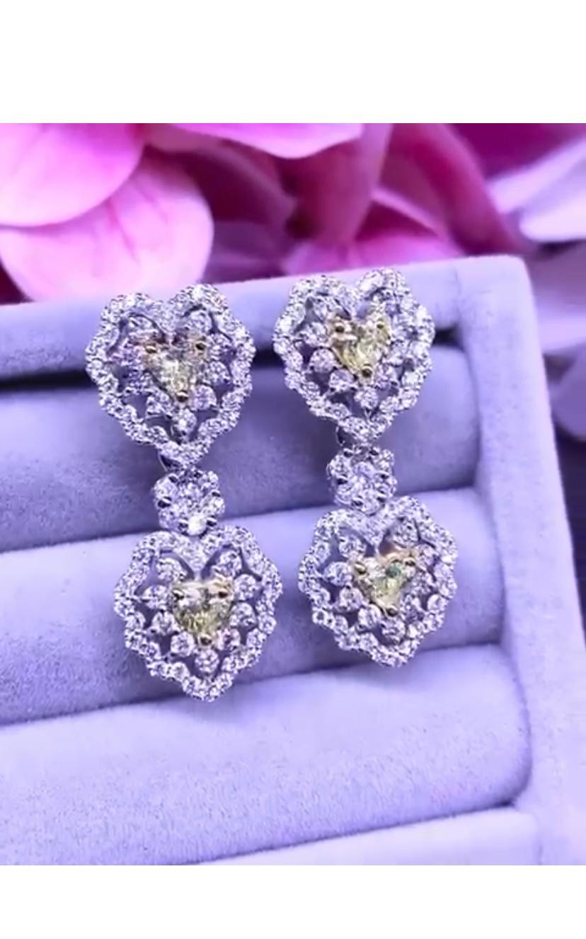 Heart Cut Certified 3.52 Carats Fancy Yellow Diamonds and White Diamonds 18K Gold Earrings For Sale