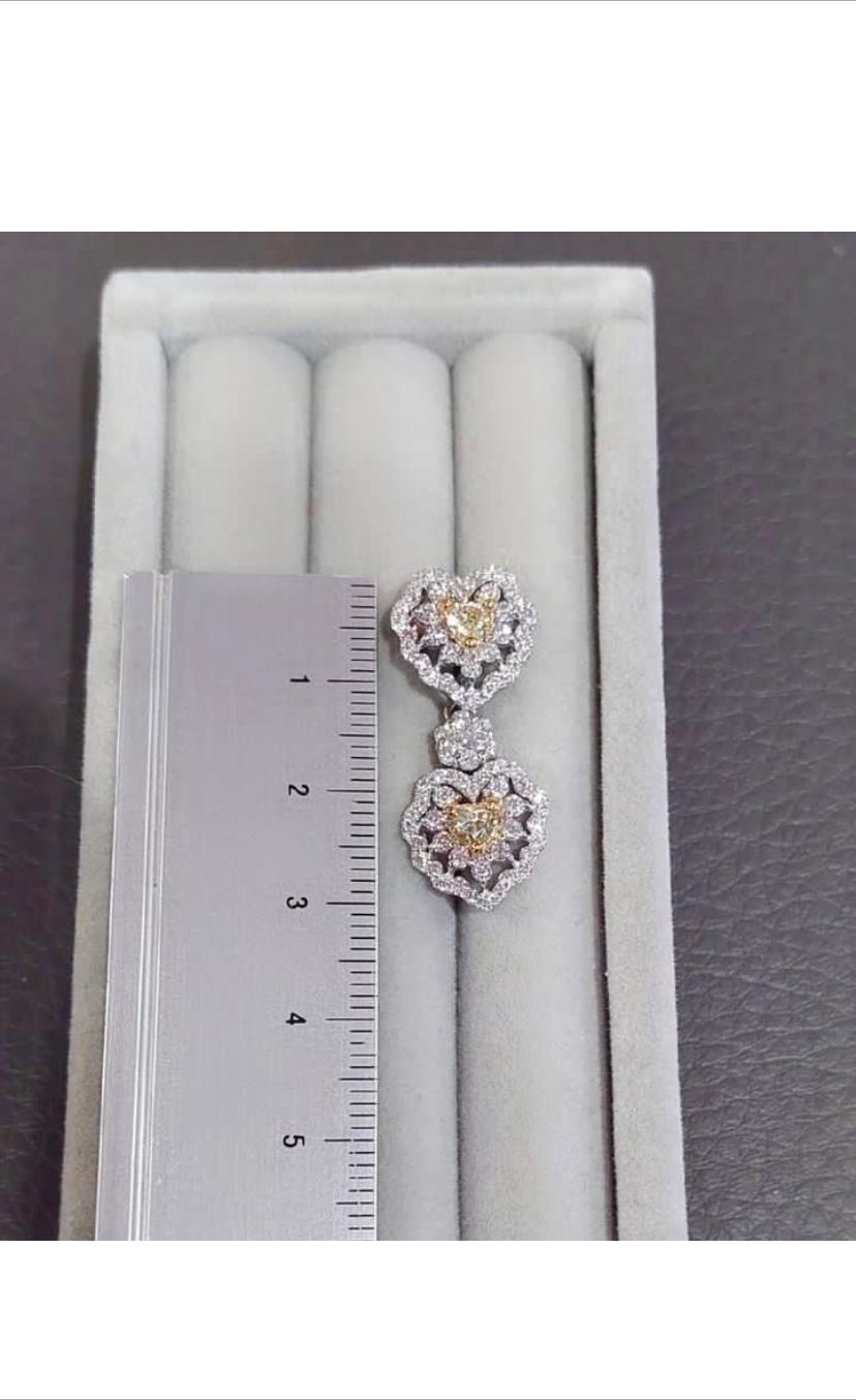 Certified 3.52 Carats Fancy Yellow Diamonds and White Diamonds 18K Gold Earrings For Sale 1