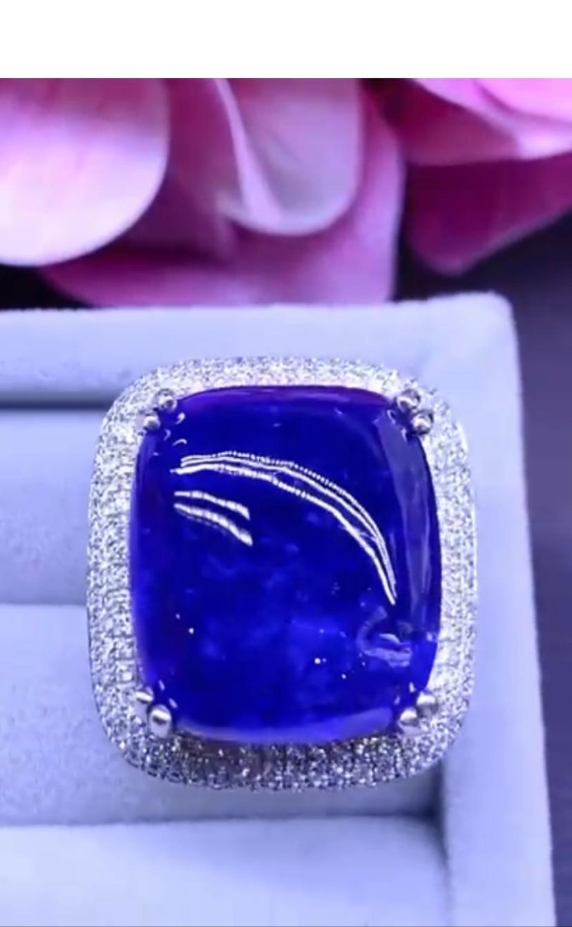 AIG Certified 40 Carat Tanzanite Diamonds 18k Gold Ring  In New Condition For Sale In Massafra, IT