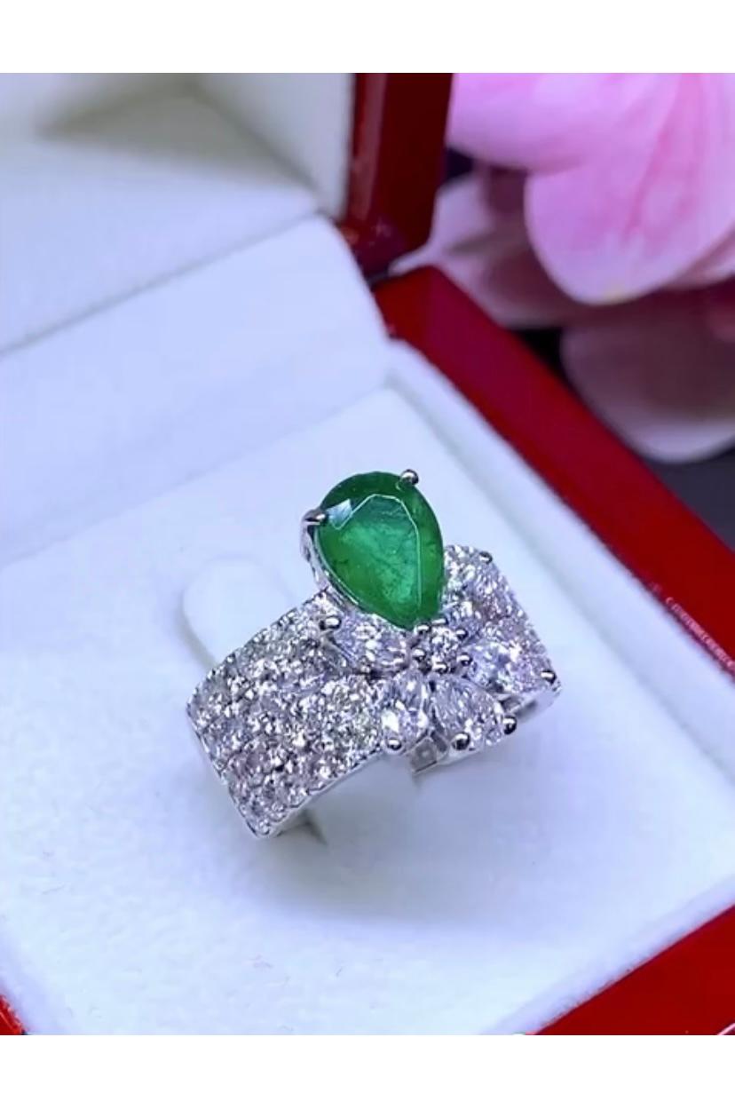 Pear Cut Amazing 4.23 carats of Zambia emerald and diamonds on ring  For Sale