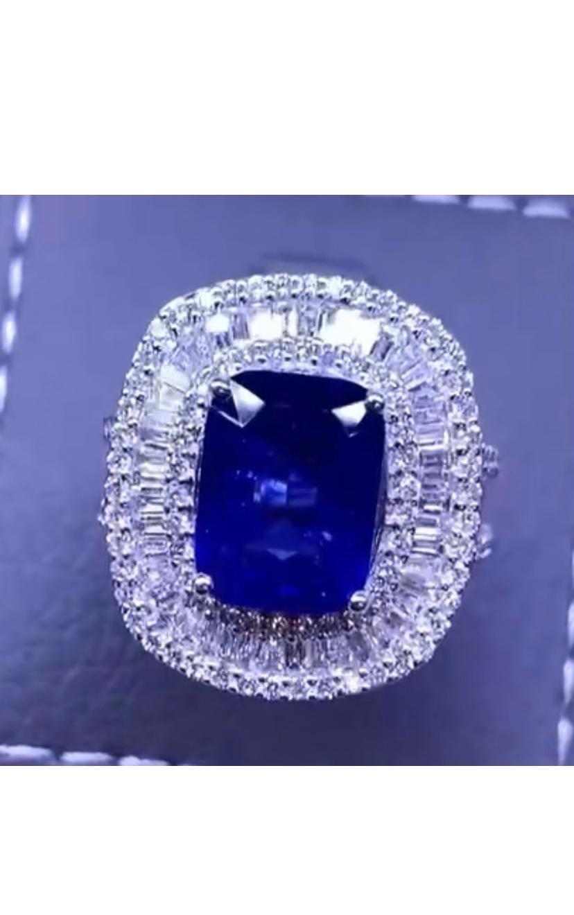 Stunning and glamour design, modern and refined style, so chic , sophisticated.
Ring come in 18k with a  natural Blue Ceylon Sapphire  of 5,23 carats and diamonds baguettes and round brilliant cut of 2,30 F/VS.
Handcrafted by artisan