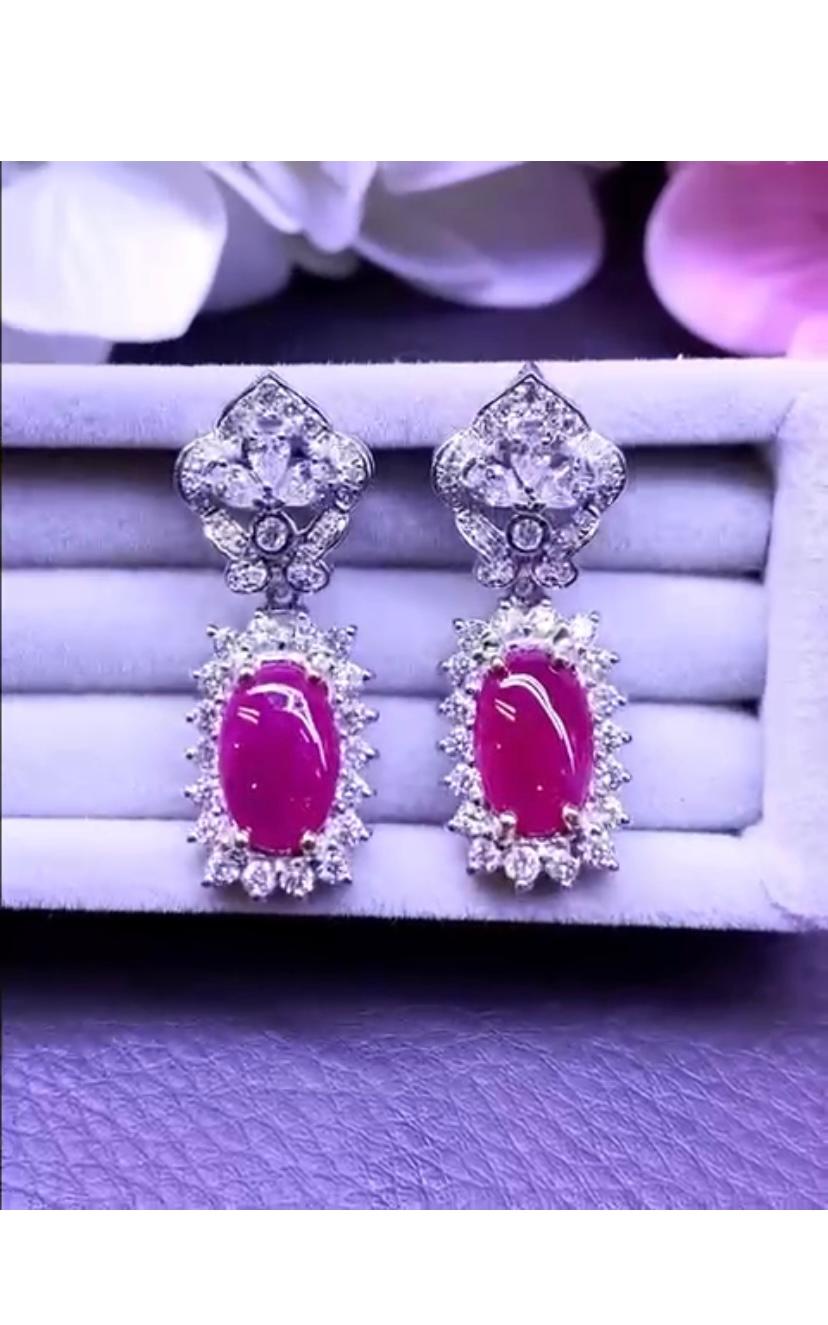 So chic and elegant style for that earrings in 18k gold with two pieces of Burma rubies,fine quality, in cabochon cut of 5,95 carats, and diamonds in special cut of 2,32 carats,F/VS.
Art and design by artisan goldsmith.
Excellent manufacture and