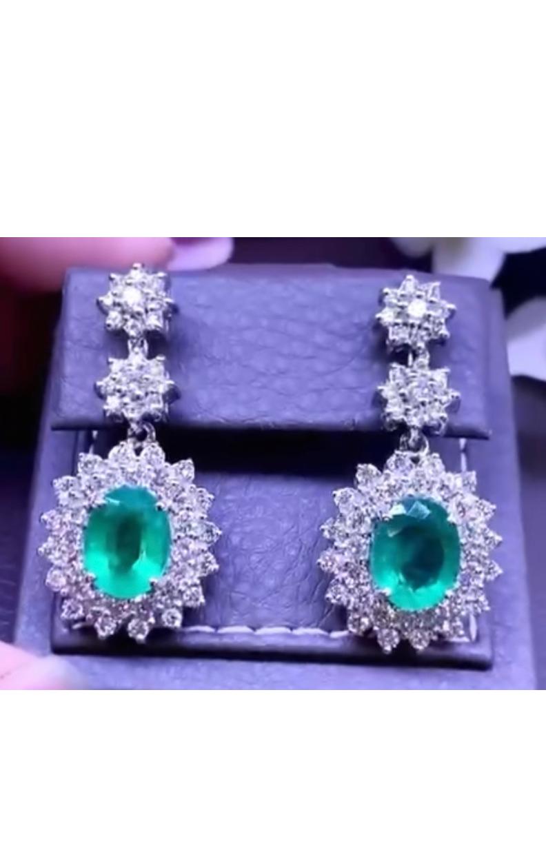 Women's Amazing 8.53 Carats of Emeralds and Diamonds on Earrings For Sale