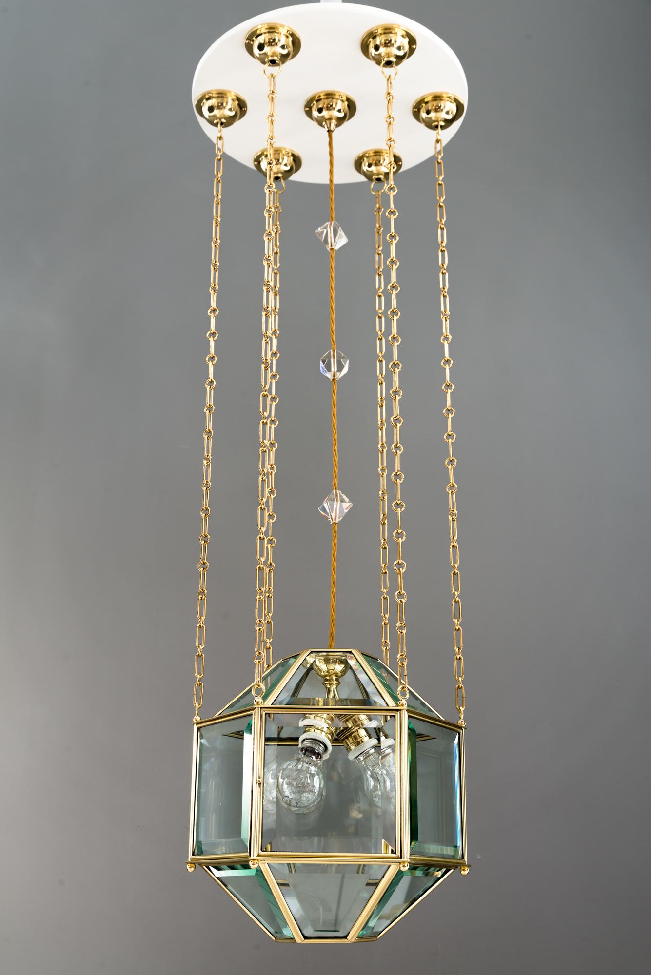Amazing and big chandelier with original cut glasses, Vienna, circa 1910s
Brass polished and stove enameled
3 bulbs inside
One side has a door who can be opened for bulbs changing.
The height can be relatively 