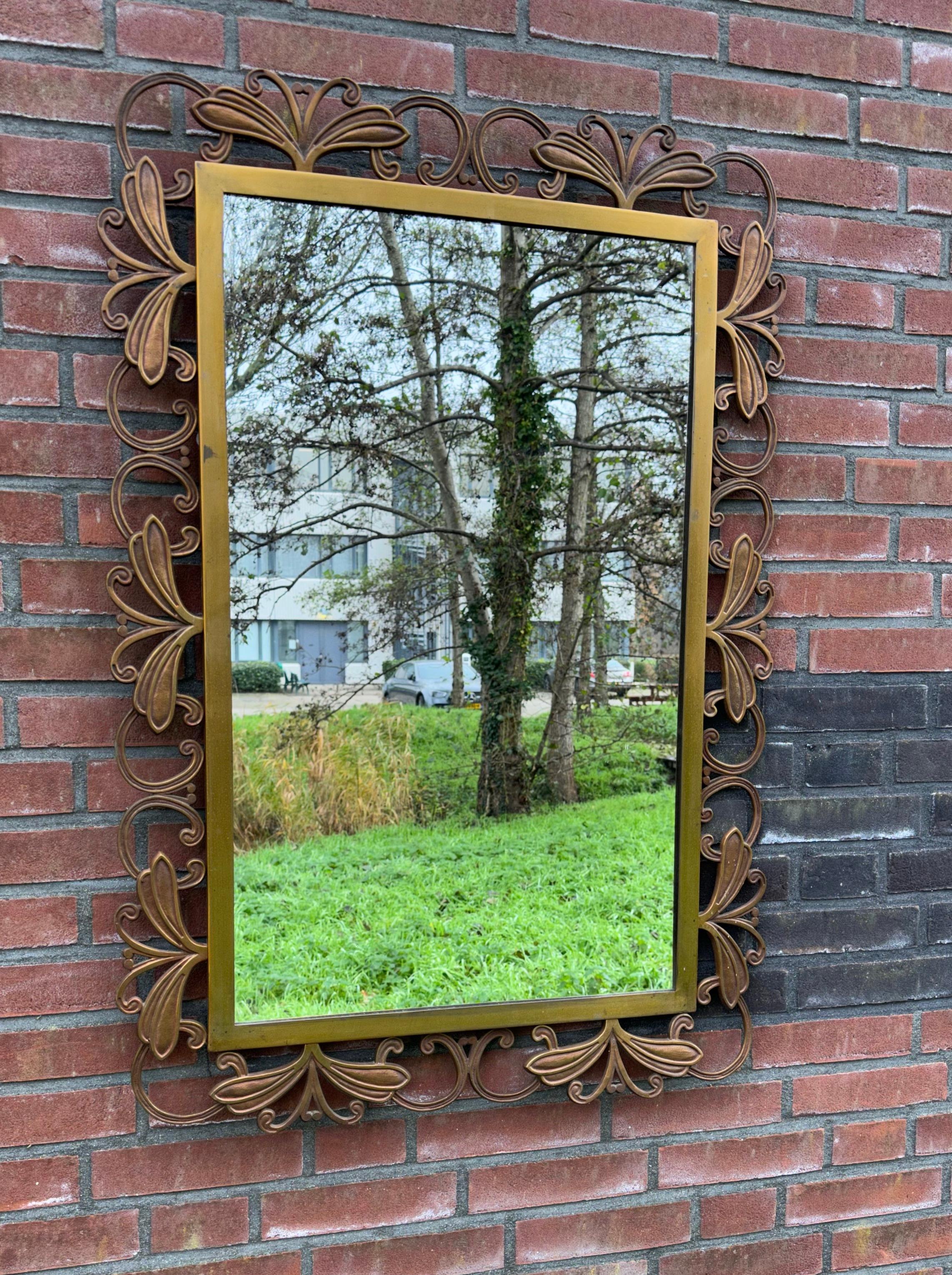 Large size and top quality bronze framed mirror in the Arts & Crafts (Jugendstil Style).

Over the years we have sold a number of great quality and unique mirrors and this fine specimen in the Jugendstil Style is right up there with the best. The