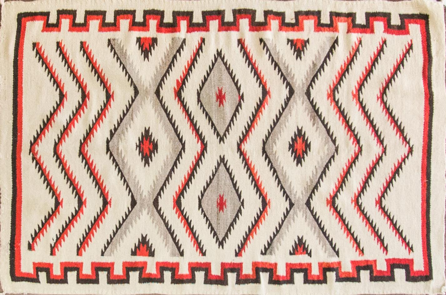 A typical Navajo rug has approximately 30 wefts to the linear inch. A two grey hills from Toadlena average about 45. The finer pieces frequently have upwards of 80. When a textile has 80 or more wefts per inch, it is considered a tapestry, not a