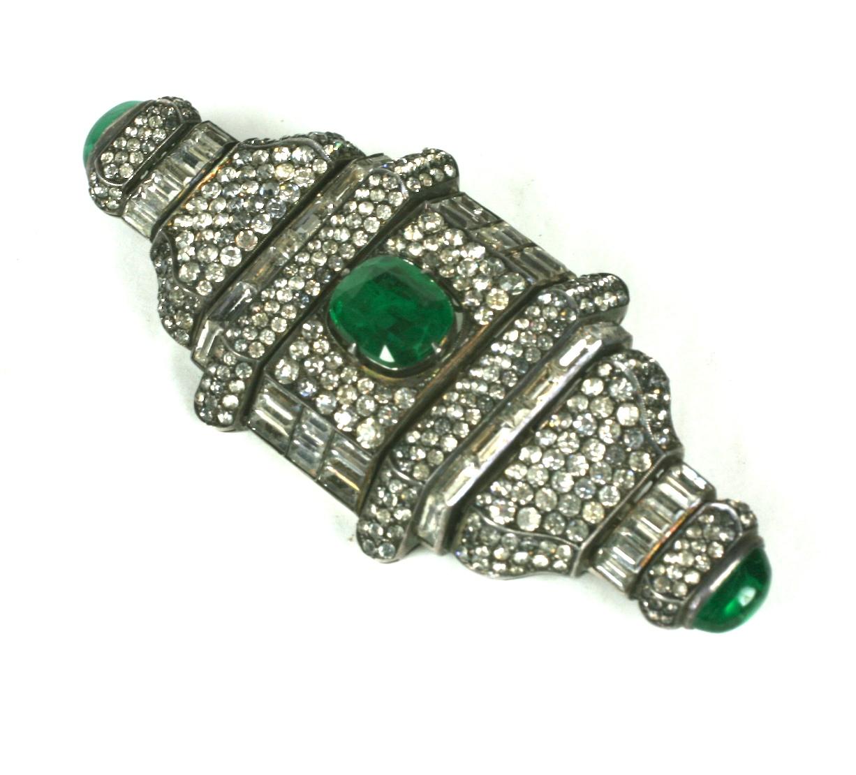 Massive and Amazing Art Deco Paste Brooch, super dimensional, the finest of its kind from this period. Wonderful quality, hand made and set in sterling silver with faux emeralds and diamonds.
1930's France.   3.5