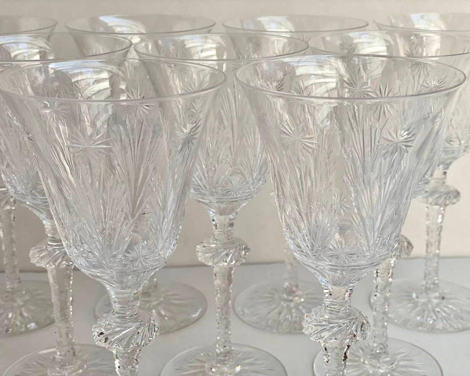 Charming vintage crystal wine or champagne glasses, set 9 pieces, produced in Germany by Glasfabrik Barthmann, circa 1960s. 

Barthmann glasses are famous for their unsurpassed beauty and royal splendor. 

Colorless cut and 30% lead oxide