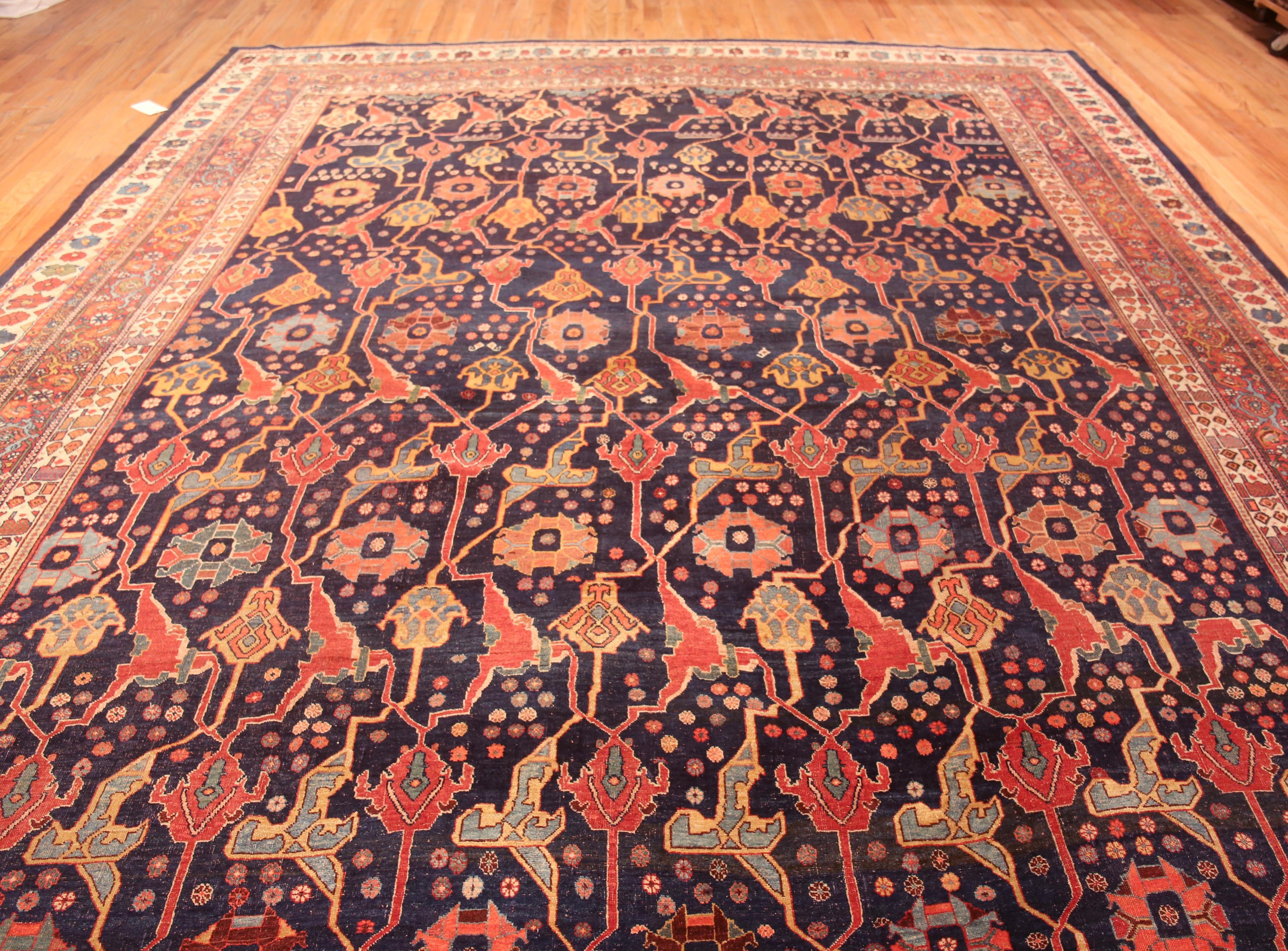 Superbe tapis persan ancien Bidjar à fond bleu 11'10