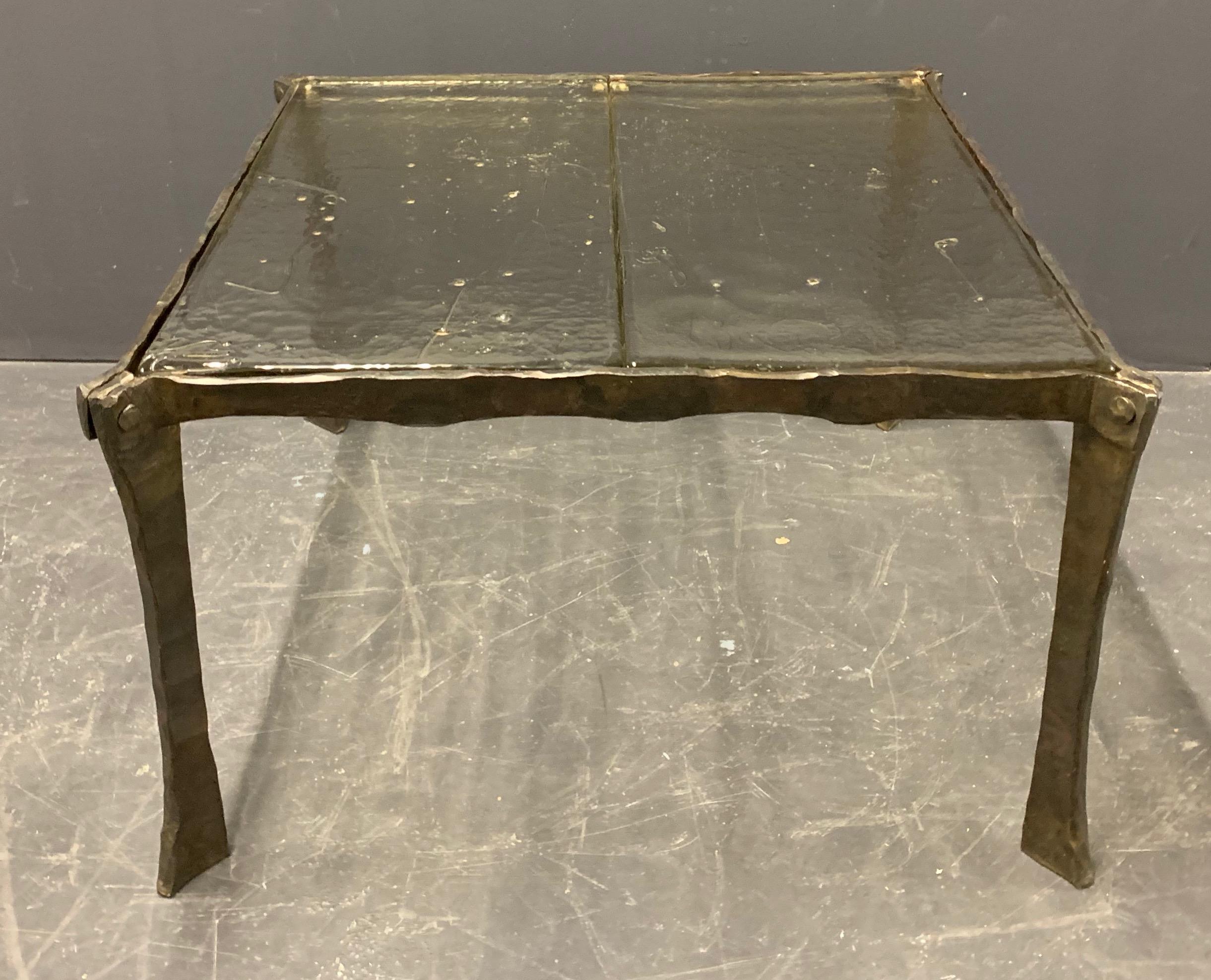 Wonderful artist Brutalist coffee table with rare glass split top version. Glass tops and base are made by hand.