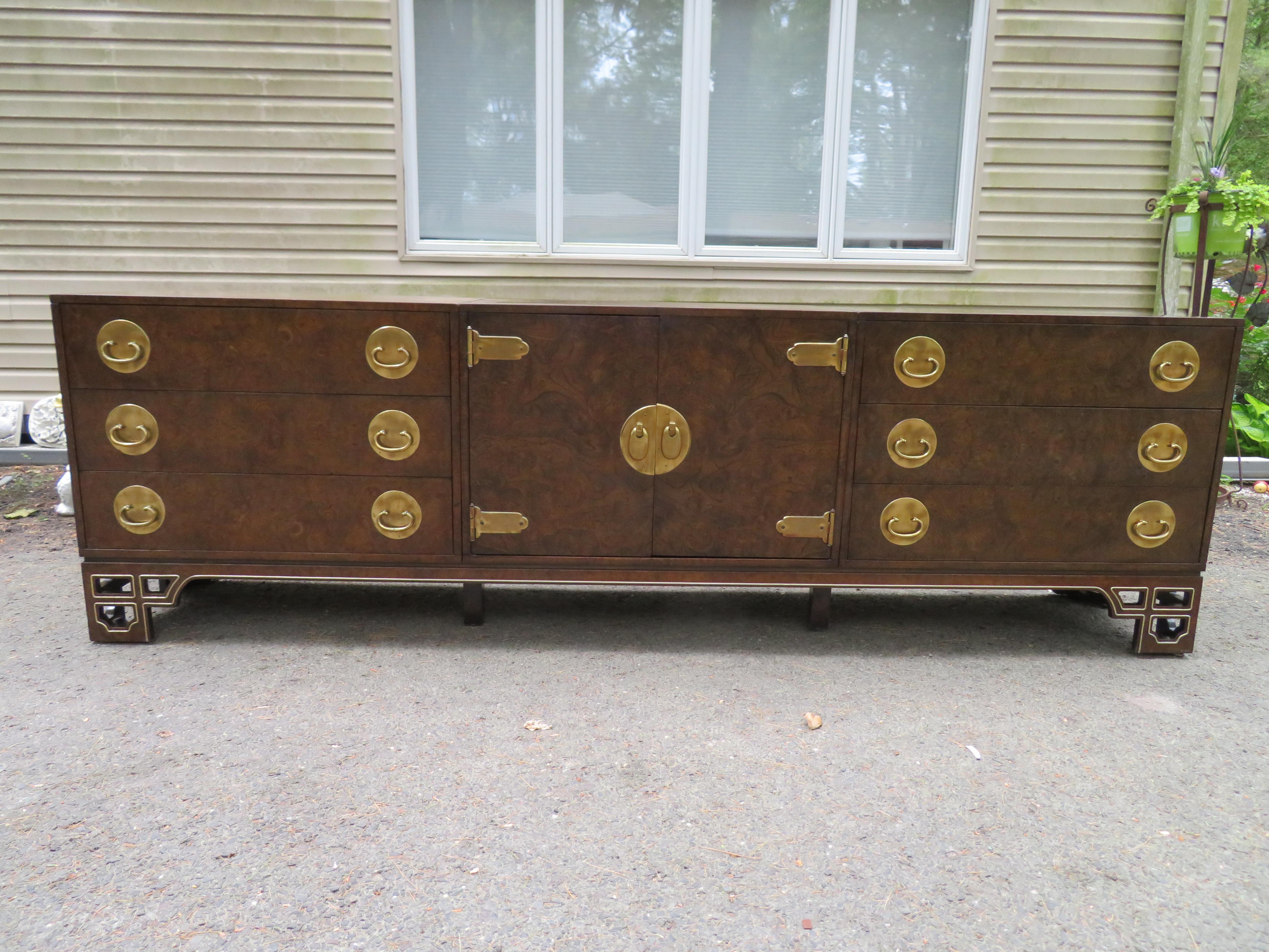 Amazing burled amboyna and brass three-piece chinoiserie Mastercraft credenza buffet. Wow! is what you will say when you see this stunning three-piece cabinet set that sits on a removable base-makes for easy moving. This set is in fabulous vintage