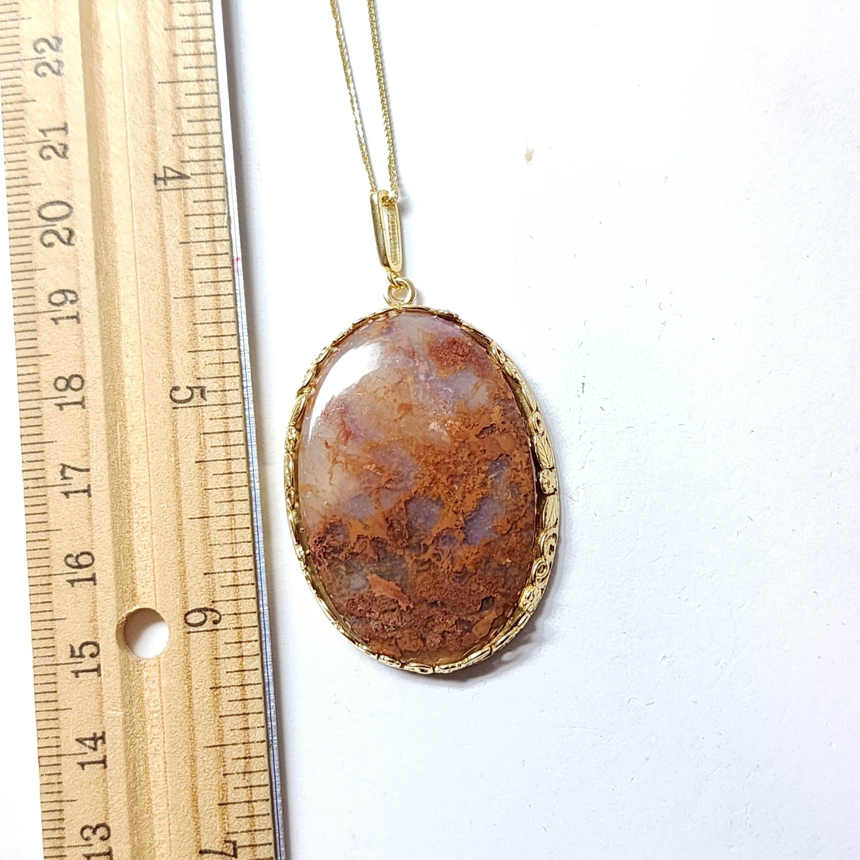 Ciondolo in agata Carey Plume Nature.

Presenta un bellissimo flash marrone arancione intenso 
Unica forma ovale a chiave di volta. Agata Carey Plume
La nostra collana, di grandi dimensioni, presenta una grande pietra ovale con inclusioni naturali