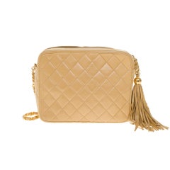 Amazing Chanel Camera front pocket crossbody bag in beige quilted leather, GHW