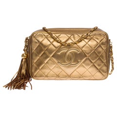 Amazing Chanel Camera shoulder bag in Golden quilted leather, GHW