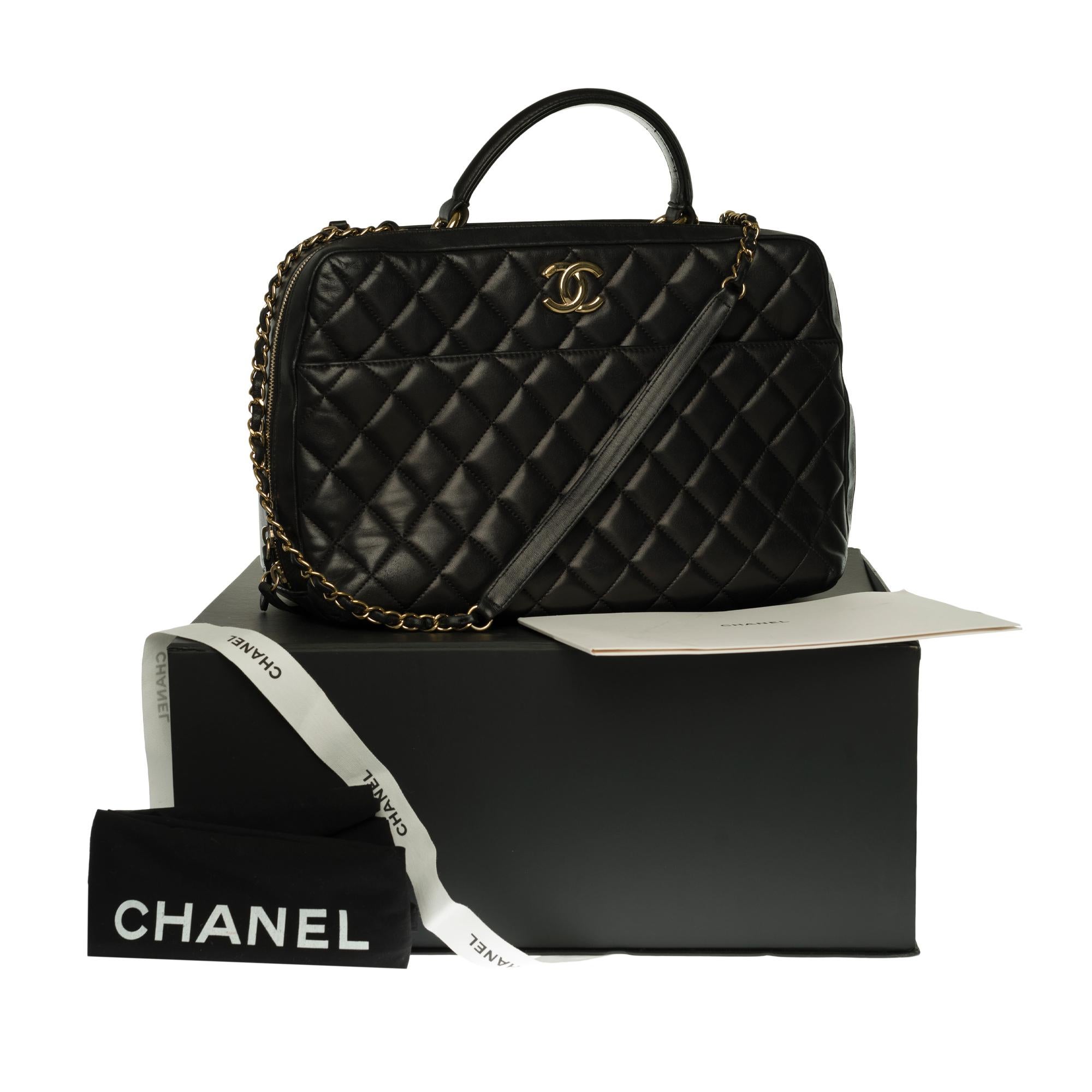 Chanel CC Vanity Case Bag. 
This new vanity case is part of Chanel’s Fall/Winter 2018 Act 2 Collection. The bag is made of calfskin and comes with a gold-tone metal hardware. It features the interlocking CC logo with a top handle. It also includes a