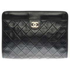 Amazing Chanel Classic Clutch in black quilted lambskin 