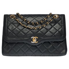 Chanel Classic Double flap Umhängetasche aus schwarzem gestepptem Lammfell, GHW