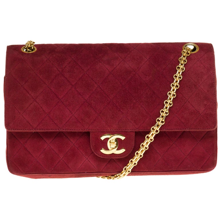 Amazing Chanel Classique handbag in red suede and gold hardware at
