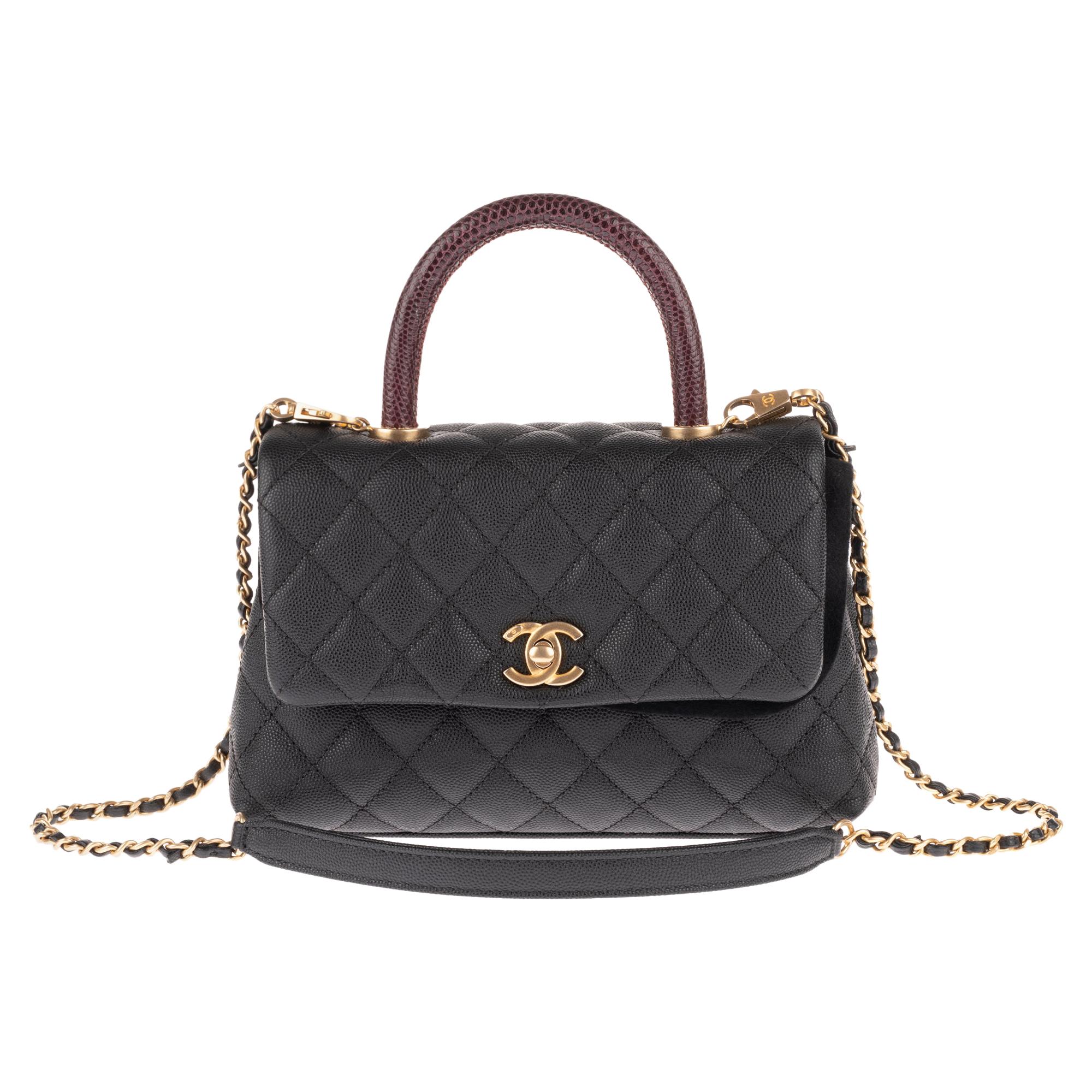 Amazing Chanel Coco handbag in black caviar leather, handle in brown lizard  !