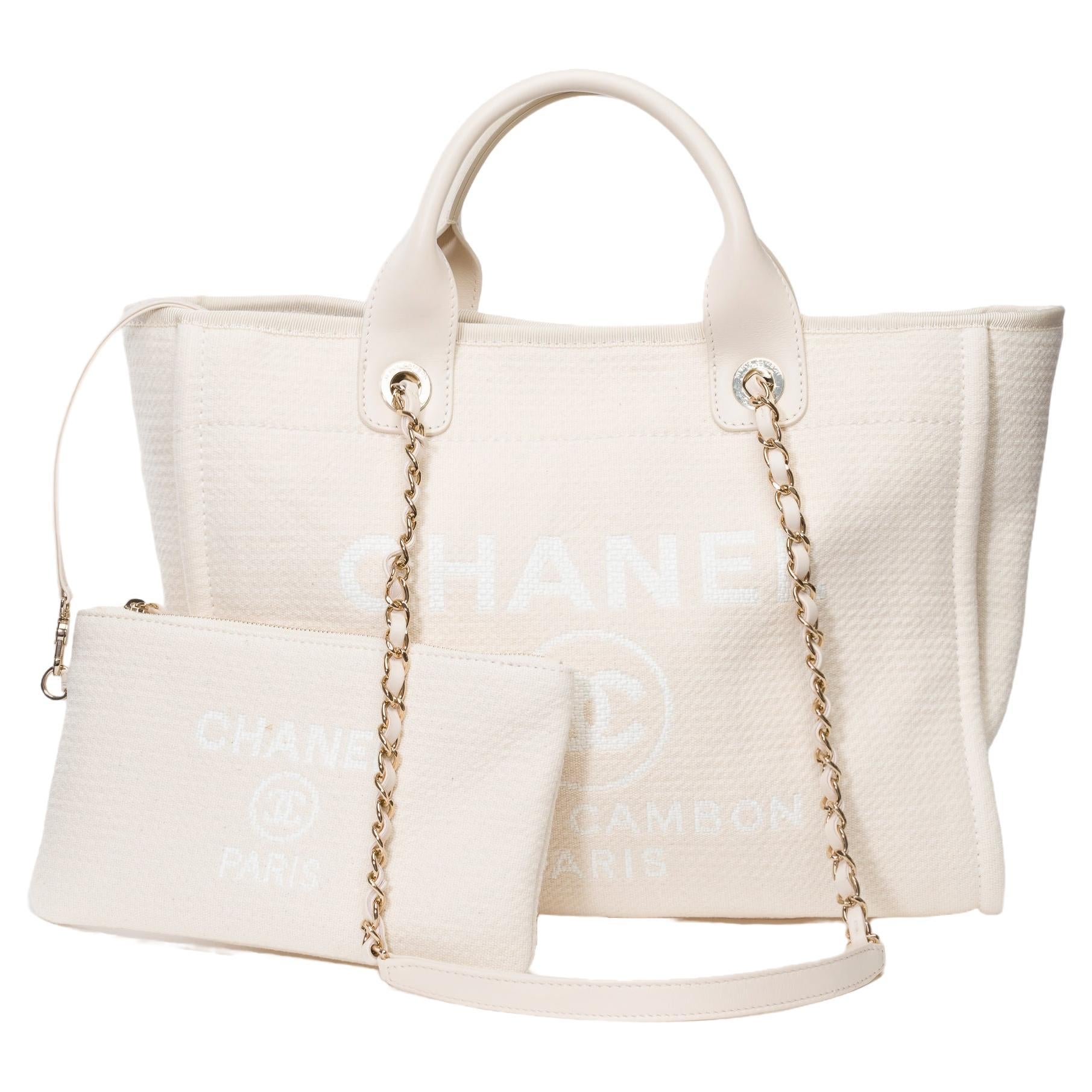 Amazing Chanel Deauville tote bag in off white canvas, SHW